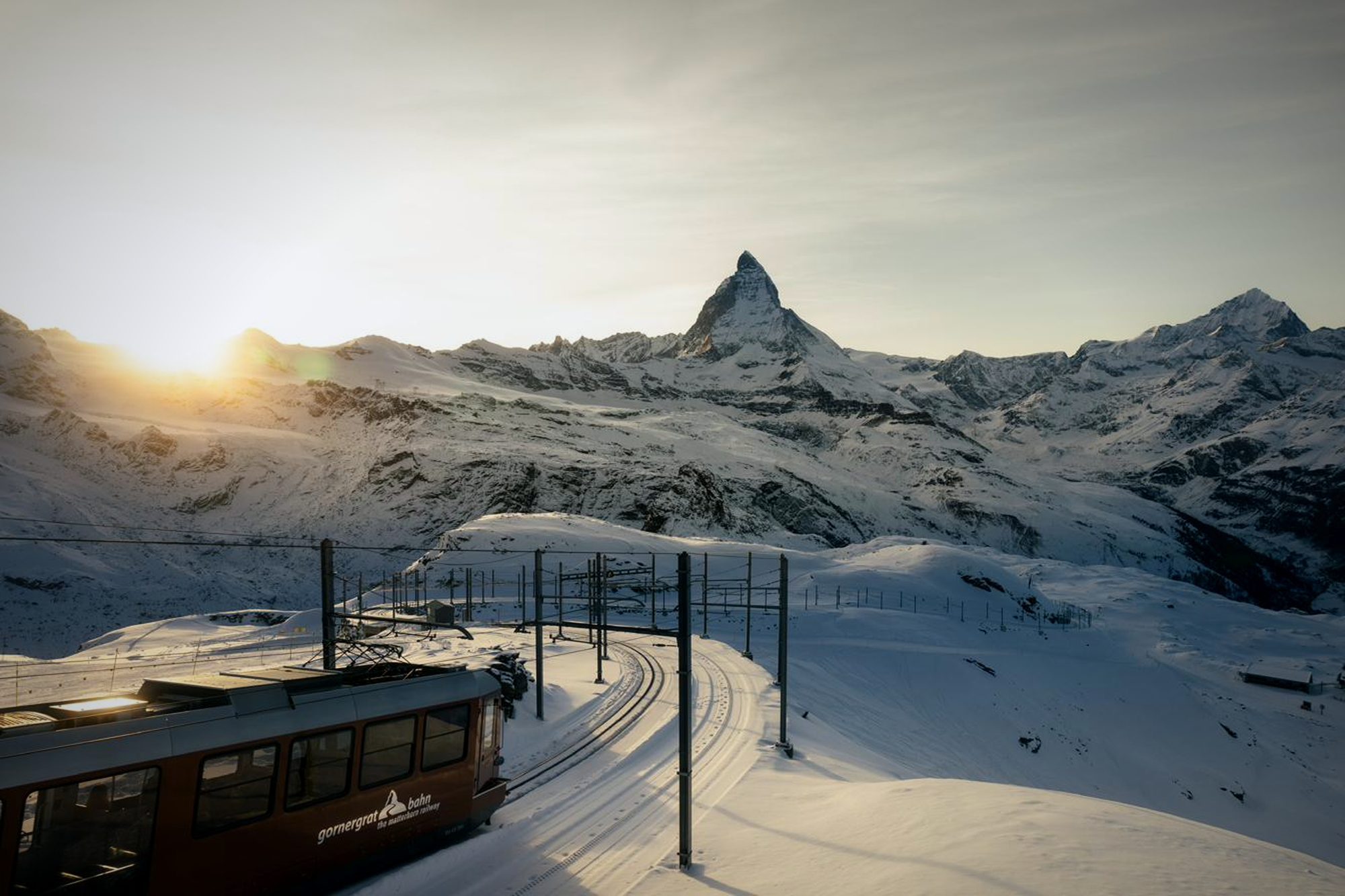 The Gornergrat Bahn beneath the Matterhorn at sunrise